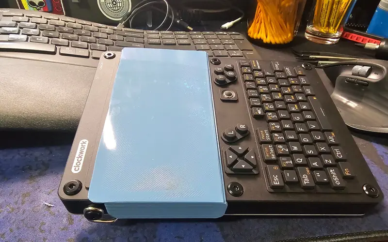 Preview image from ClockworkPi forum for “Clip-on screen cover (FelixAtter, X-Stranger remix)”