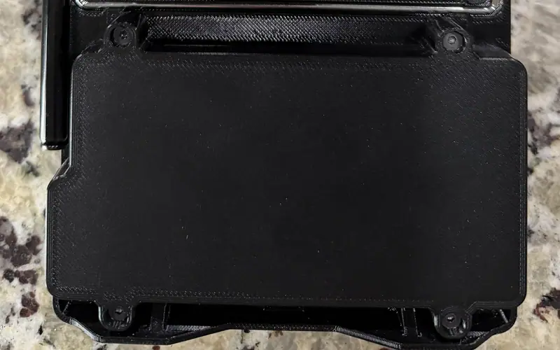 Preview image from ClockworkPi forum for “Printed carry handle in place of the kickstand (WhyDev)”